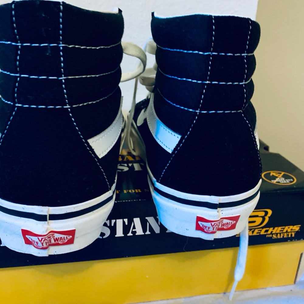 Vans Black and White High-Top Sneakers